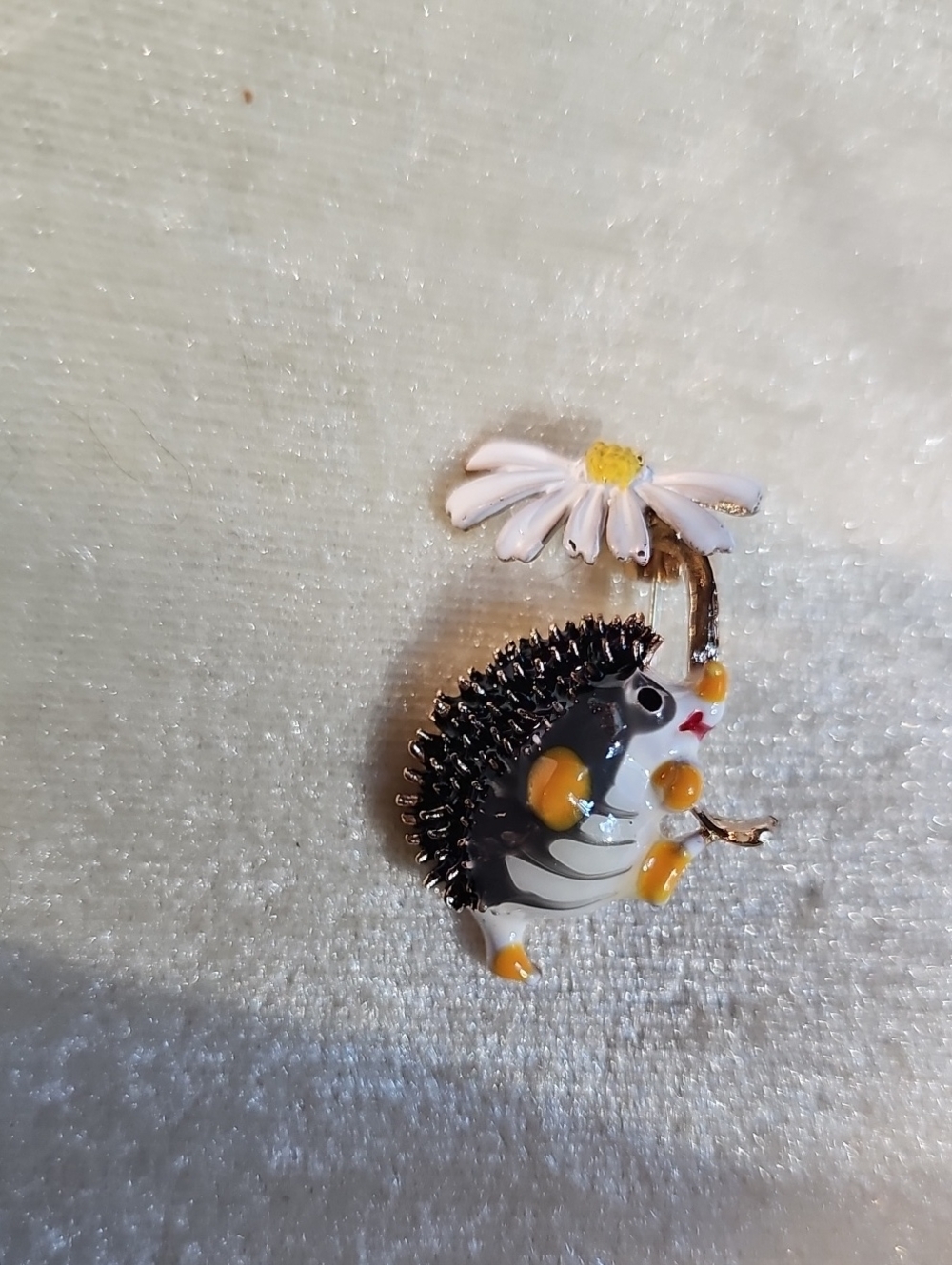 Decorative Hedgehog Brooch with White Daisy Accent